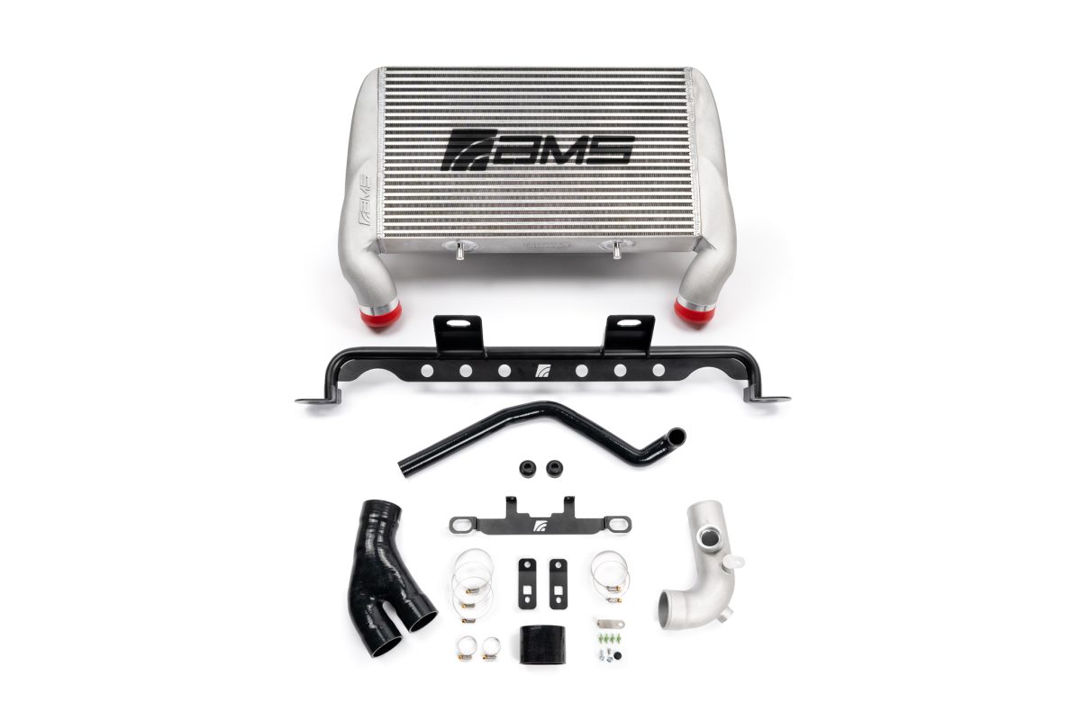 AMS Performance F150 and Raptor High Mount Intercooler kit in silver with support bar, bracket, outlet tube and hardware