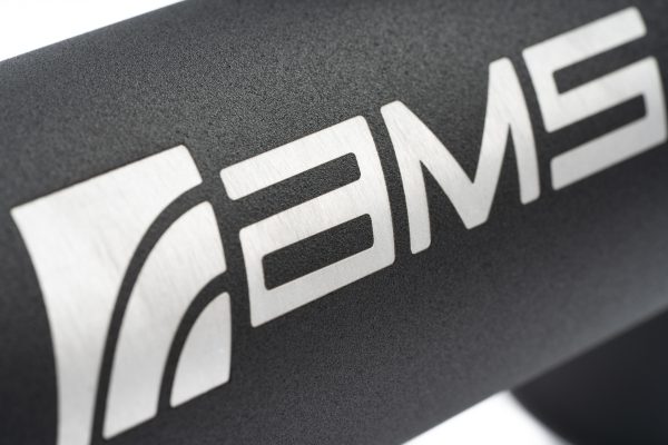 Close up of the AMS logo on a black powder coated F150 intercooler pipe